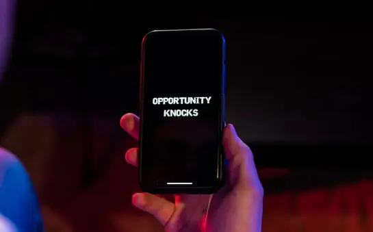 Phone screen stating 'Opportunity knocks'