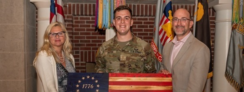 2LT Reuter ’26 Gifts Handcrafted American Flag to WPAOG 