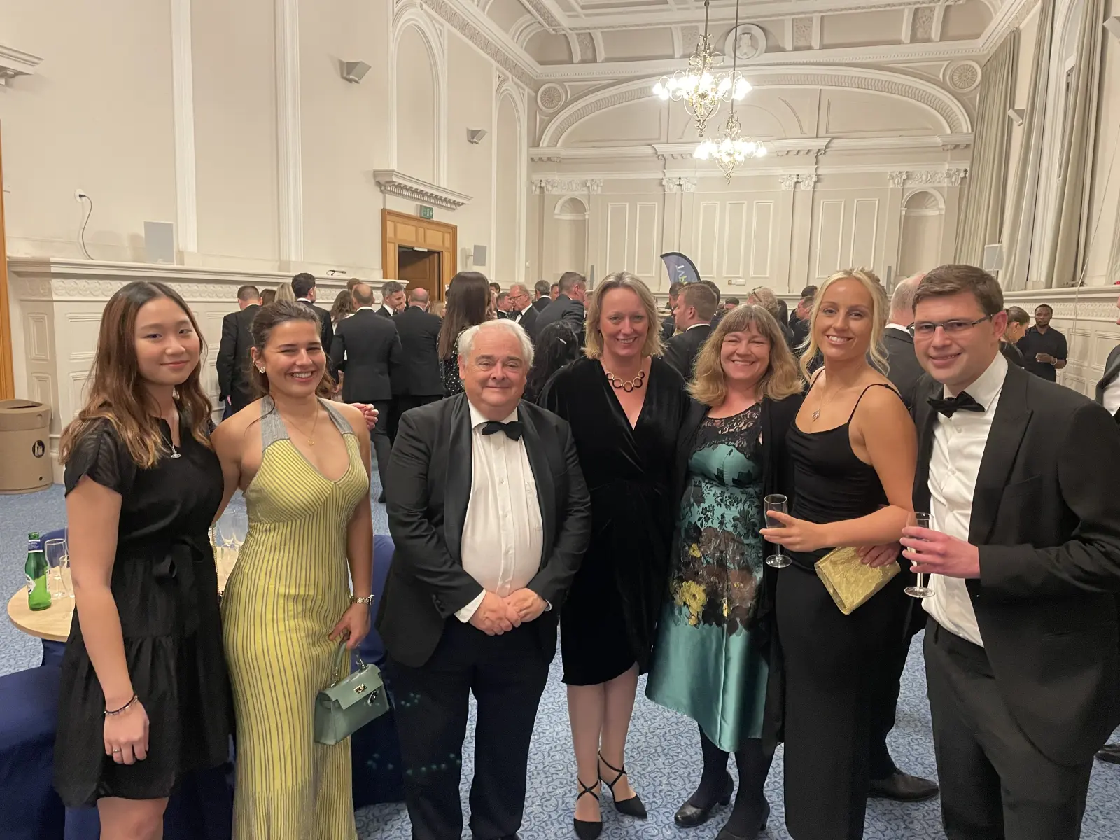 A
  group
  of
  people
  posing
  for
  a
  photo
  Description
  automatically
  generated