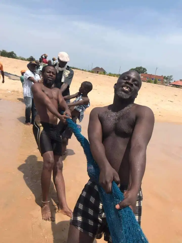 Fishermen pulling out their nets