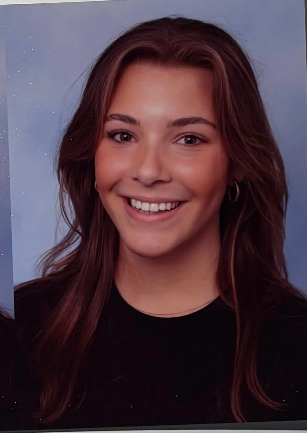 A
  person
  smiling
  at
  the
  camera
  AI-generated
  content
  may
  be
  incorrect.
