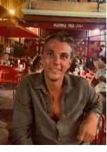 A
  person
  sitting
  at
  a
  table
  AI-generated
  content
  may
  be
  incorrect.