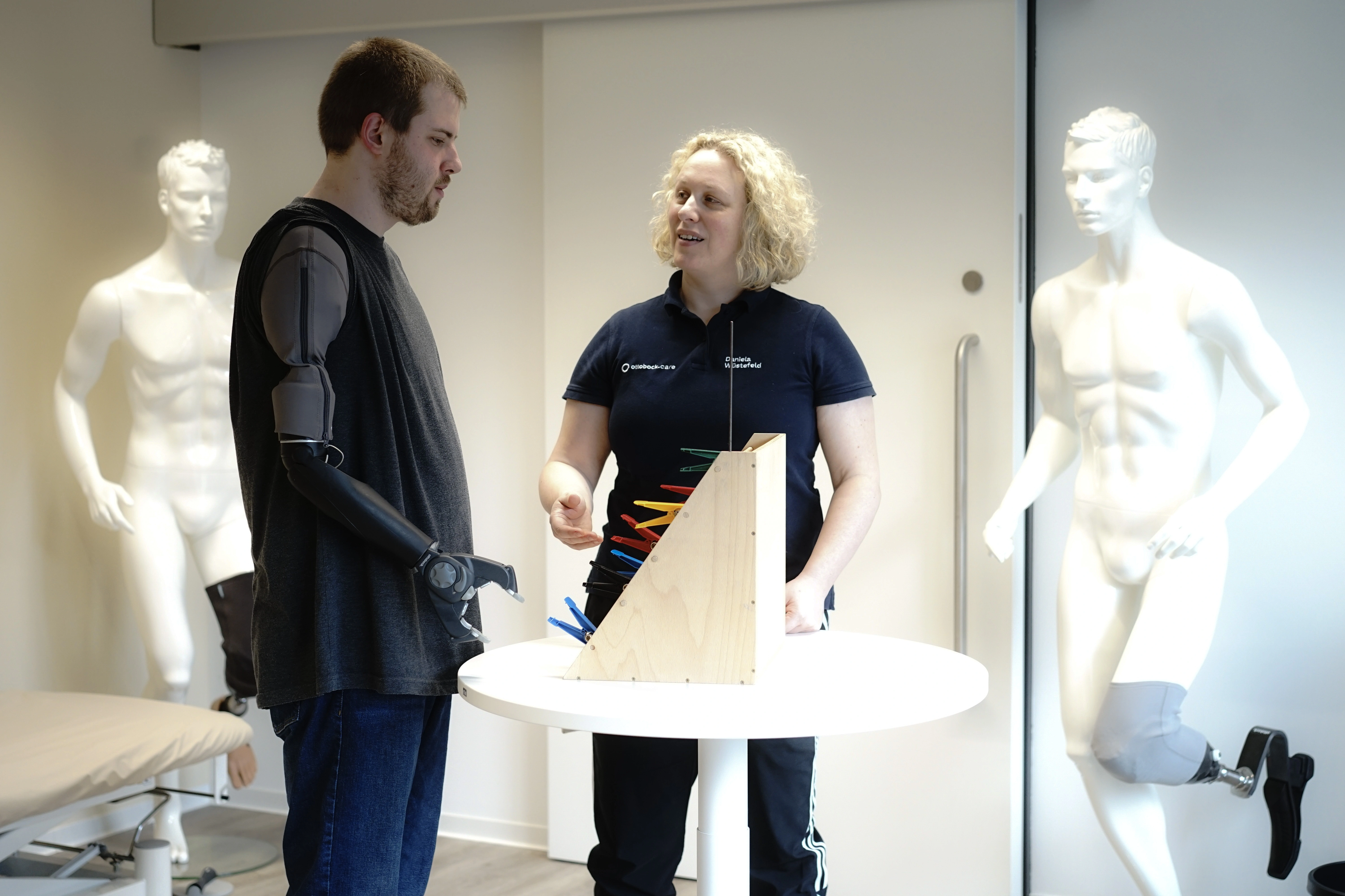 Male wearing a arm prosthesis