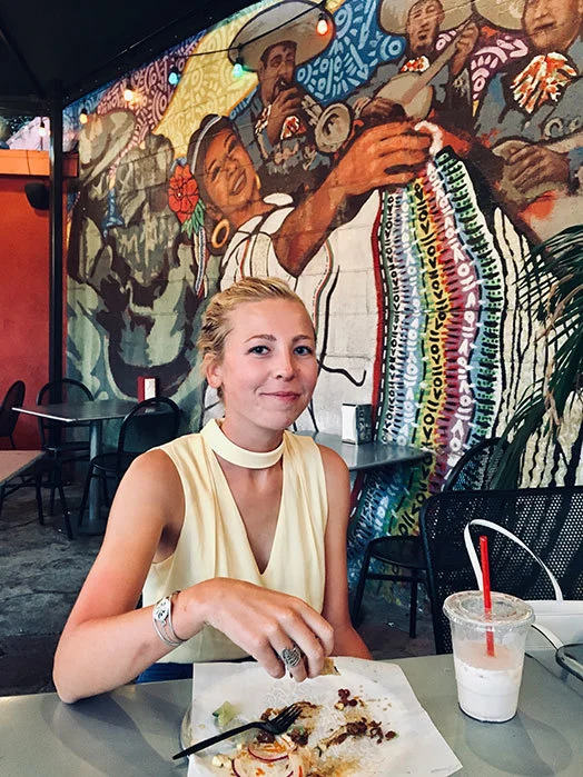 Chloe Wheeler eating tacos