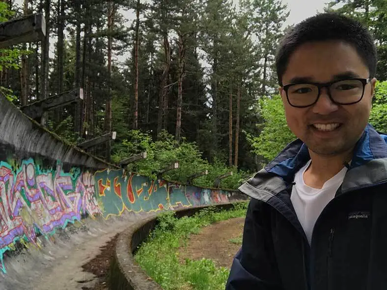 Chester pictured in front of graffiti